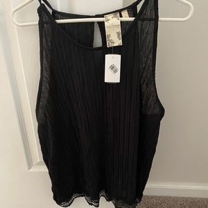 Black sleeveless blouse